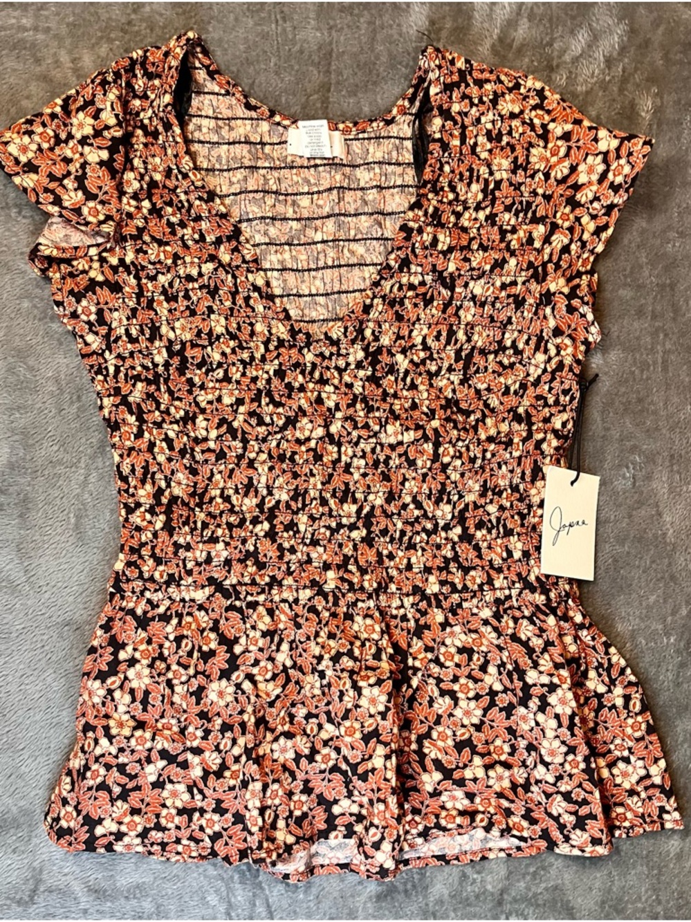 Japna Black Top with Rust Floral Print and V-Neckline